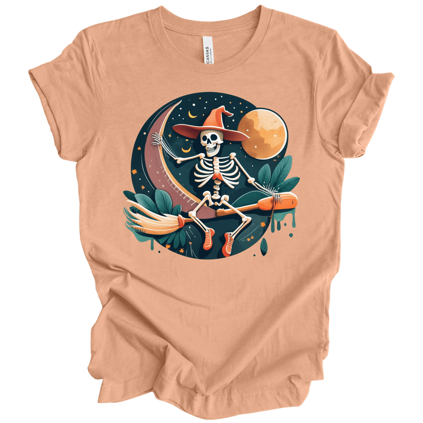 Peach halloween t-shirt with a skeleton on a broomstick wearing a witch hat in the night time.