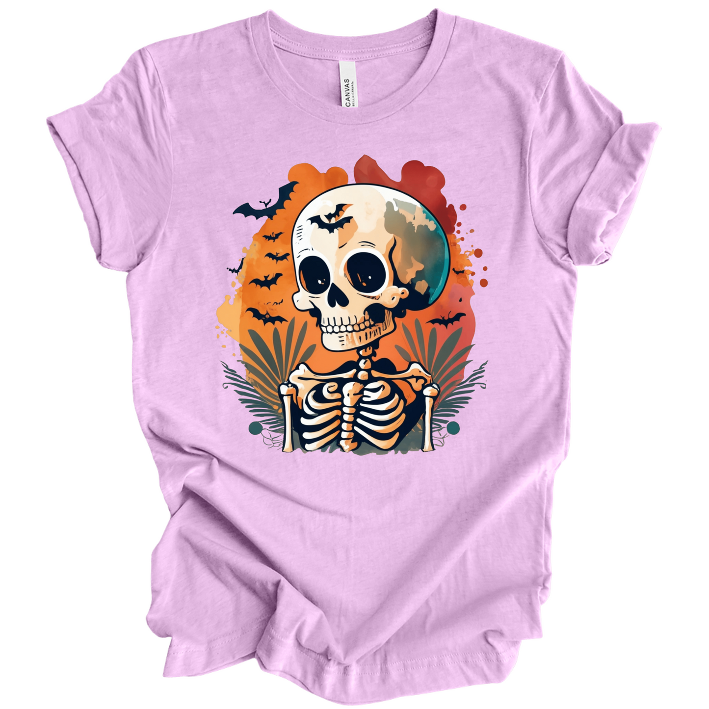 Lavender t-shirt with a Halloween-themed design featuring a skeleton and skull surrounded with bats.