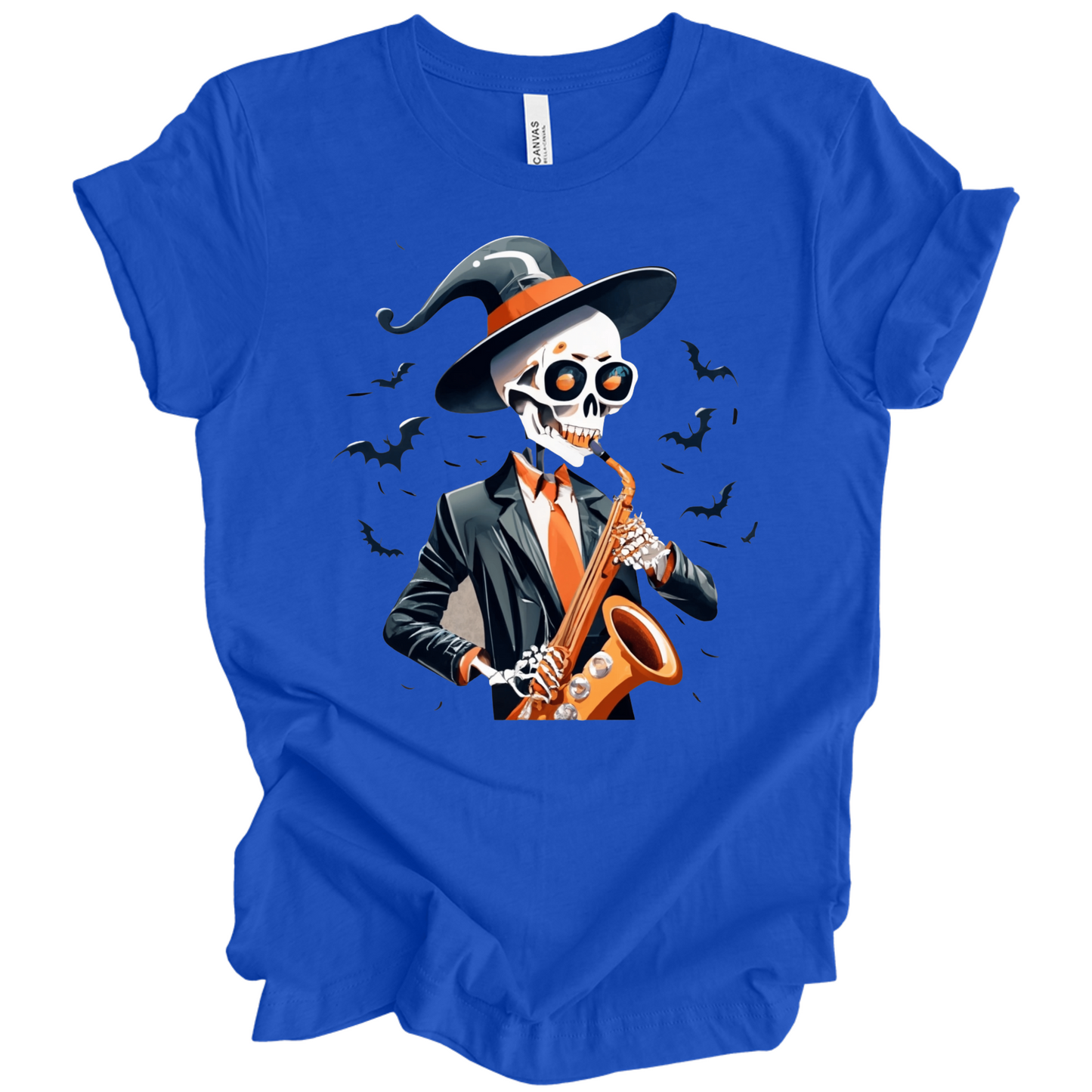 Blue halloween t-shirt with a skeleton playing a saxophone and wearing a witch hat, surrounded by bats.