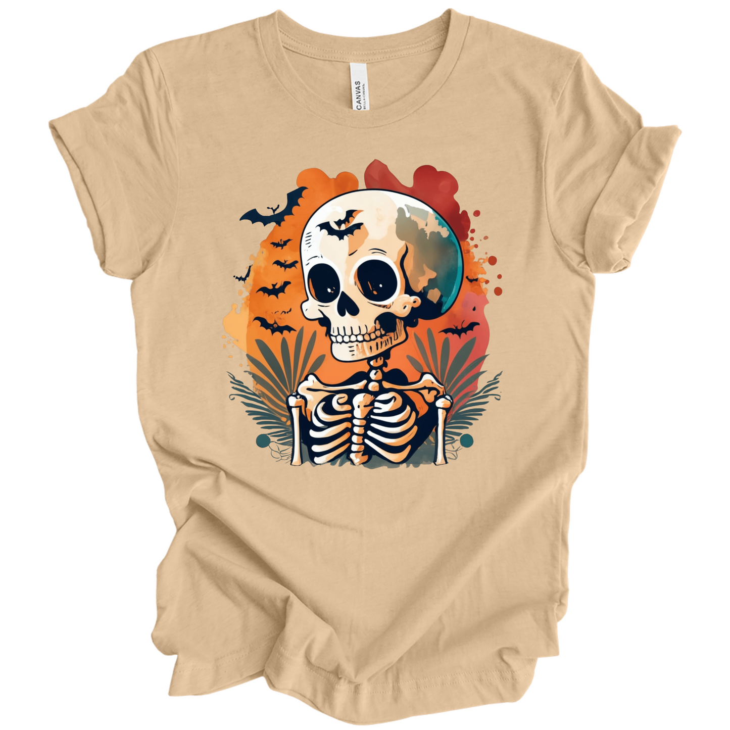 Beige t-shirt with a Halloween-themed design featuring a skeleton and skull surrounded with bats.