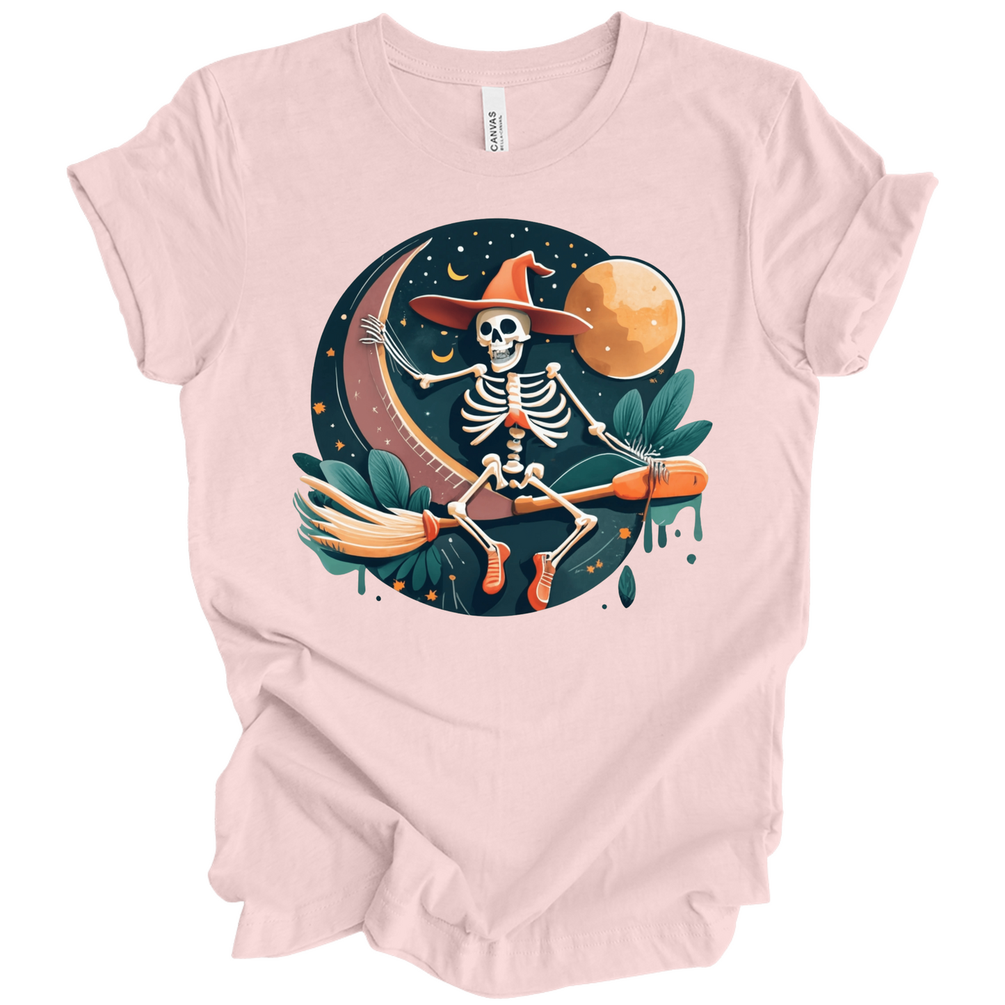 Pink halloween t-shirt with a skeleton on a broomstick wearing a witch hat in the night time.