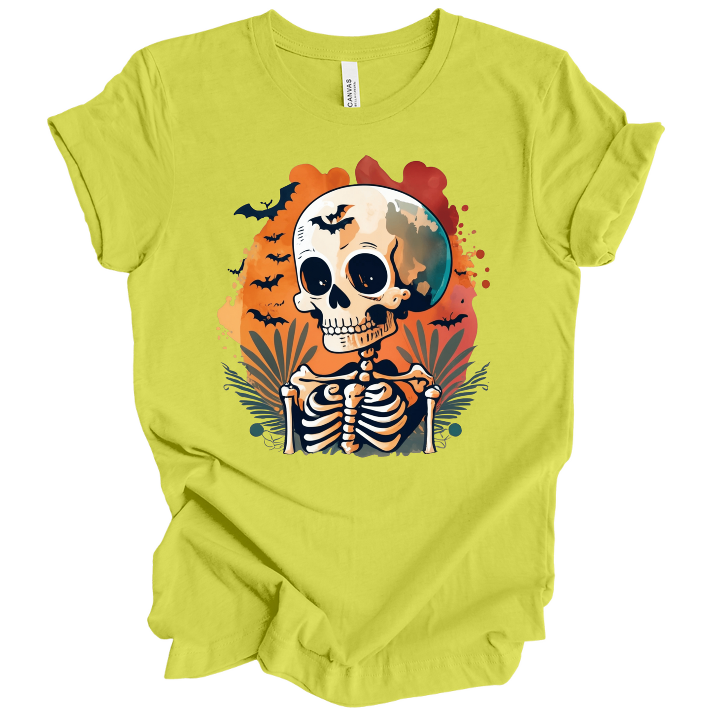 Light green t-shirt with a Halloween-themed design featuring a skeleton and skull surrounded with bats.