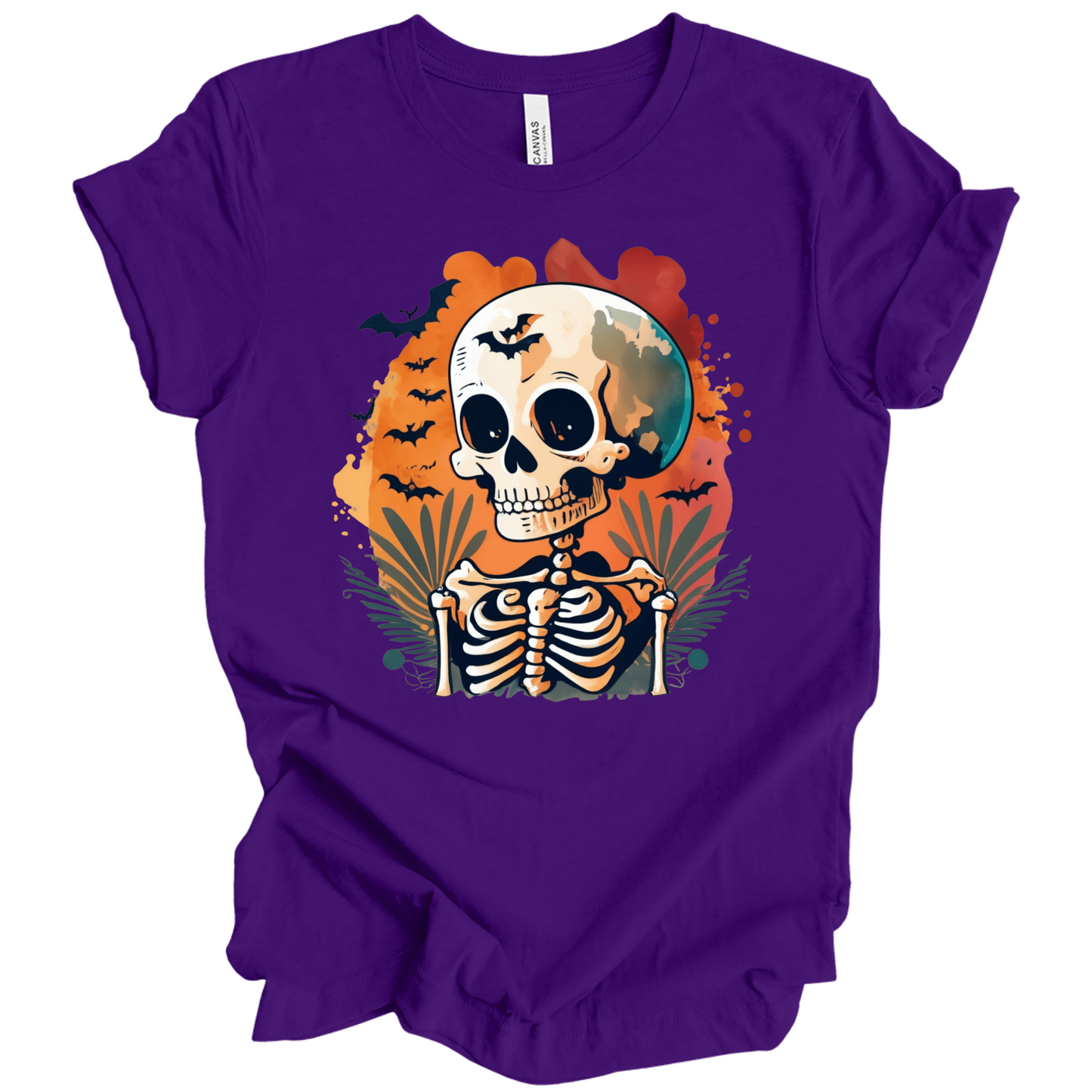 Purple t-shirt with a Halloween-themed design featuring a skeleton and skull surrounded with bats.