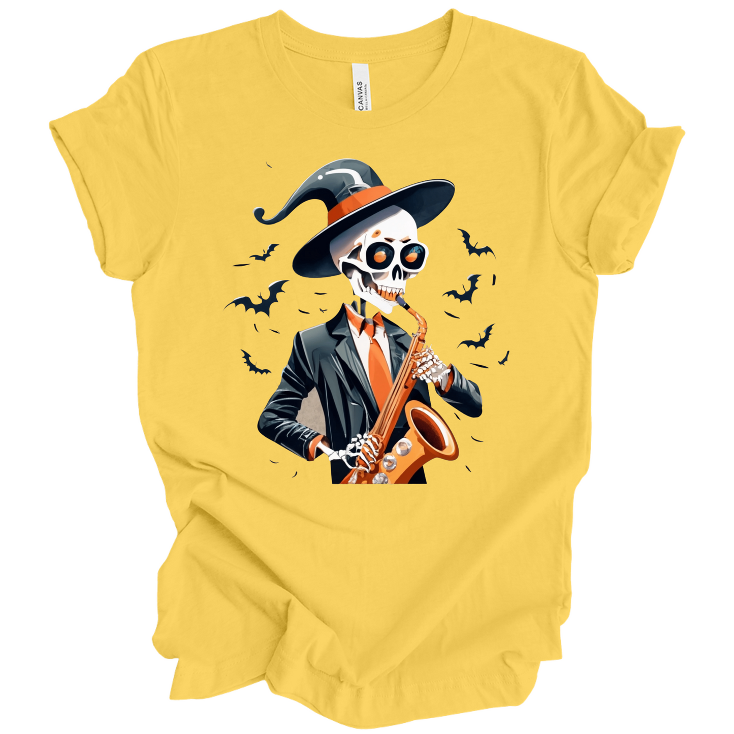 Yellow halloween t-shirt with a skeleton playing a saxophone and wearing a witch hat, surrounded by bats.
