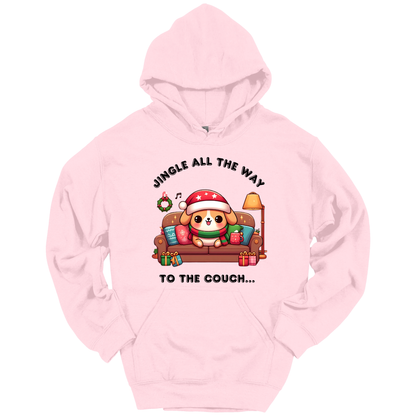 Pink hoodie with Christmas-themed design of a dog on a couch and text 'Jingle all the way to the couch'.
