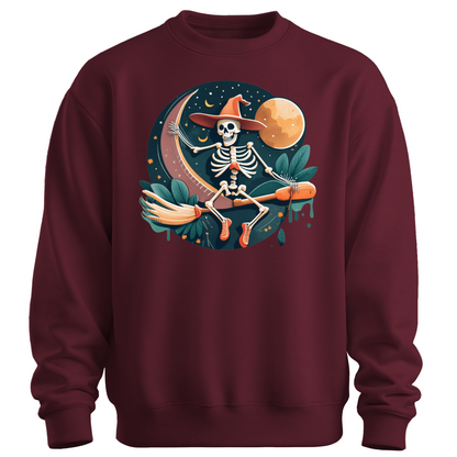 Maroon halloween sweatshirt with a skeleton on a broomstick wearing a witch hat in the night time.