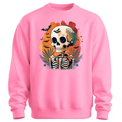 Pink sweatshirt with a Halloween-themed design featuring a skeleton and skull surrounded with bats.