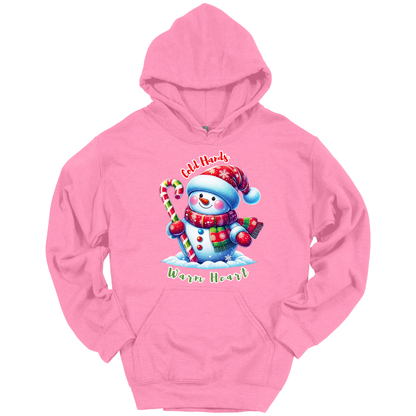 Pink Christmas hoodie with a snowman graphic with a text "Cold Hands Warm Hearts"