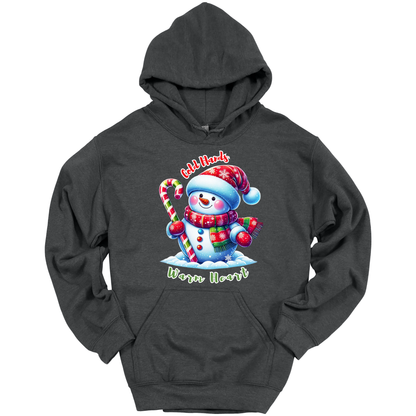 Dark gray Christmas hoodie with a snowman graphic with a text "Cold Hands Warm Hearts"