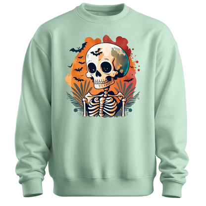 Light green sweatshirt with a Halloween-themed design featuring a skeleton and skull surrounded with bats.