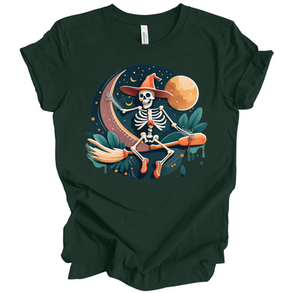 Dark green halloween t-shirt with a skeleton on a broomstick wearing a witch hat in the night time.