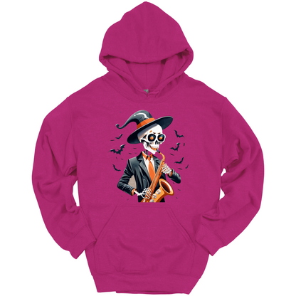 Pink halloween hoodie with a skeleton playing a saxophone and wearing a witch hat, surrounded by bats.