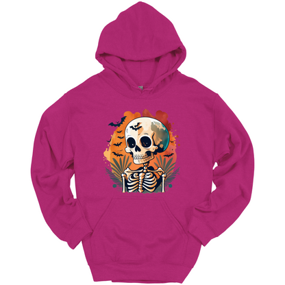 Pink hoodie with a Halloween-themed design featuring a skull and skeleton surrounded with bats.