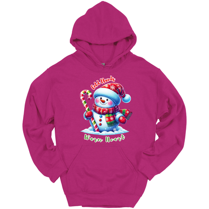 Pink Christmas hoodie with a snowman graphic with a text "Cold Hands Warm Hearts"