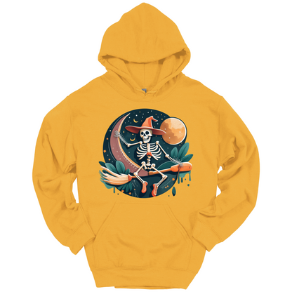 Yellow halloween hoodie with a skeleton on a broomstick wearing a witch hat in the night time.