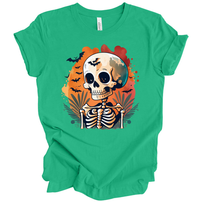 Green t-shirt with a Halloween-themed design featuring a skeleton and skull surrounded with bats.