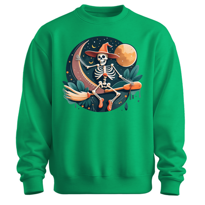 Green halloween sweatshirt with a skeleton on a broomstick wearing a witch hat in the night time.