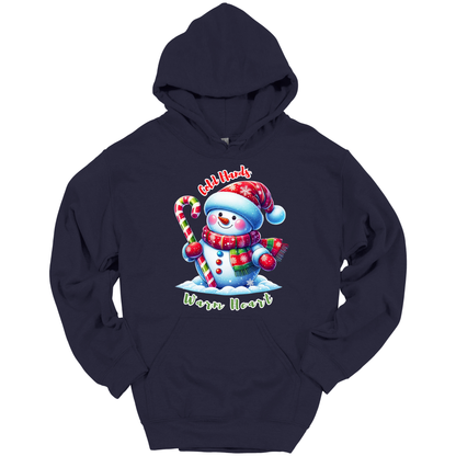 Navy blue Christmas hoodie with a snowman graphic with a text "Cold Hands Warm Hearts"