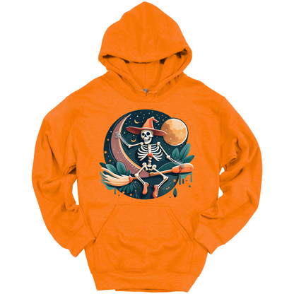 Orange halloween hoodie with a skeleton on a broomstick wearing a witch hat in the night time.