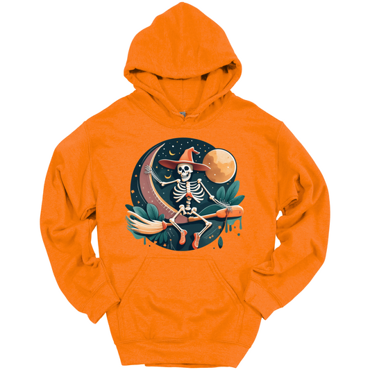 Orange halloween hoodie with a skeleton on a broomstick wearing a witch hat in the night time.