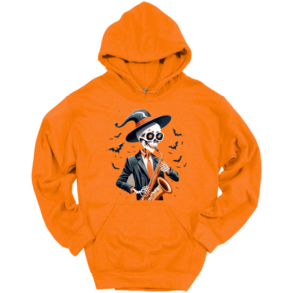 Orange halloween hoodie with a skeleton playing a saxophone and wearing a witch hat, surrounded by bats.