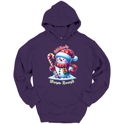 Purple Christmas hoodie with a snowman graphic with a text "Cold Hands Warm Hearts"