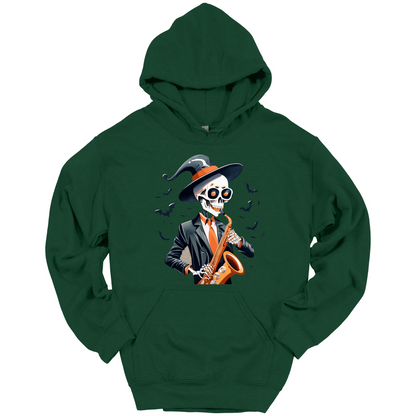 Green halloween hoodie with a skeleton playing a saxophone and wearing a witch hat, surrounded by bats.