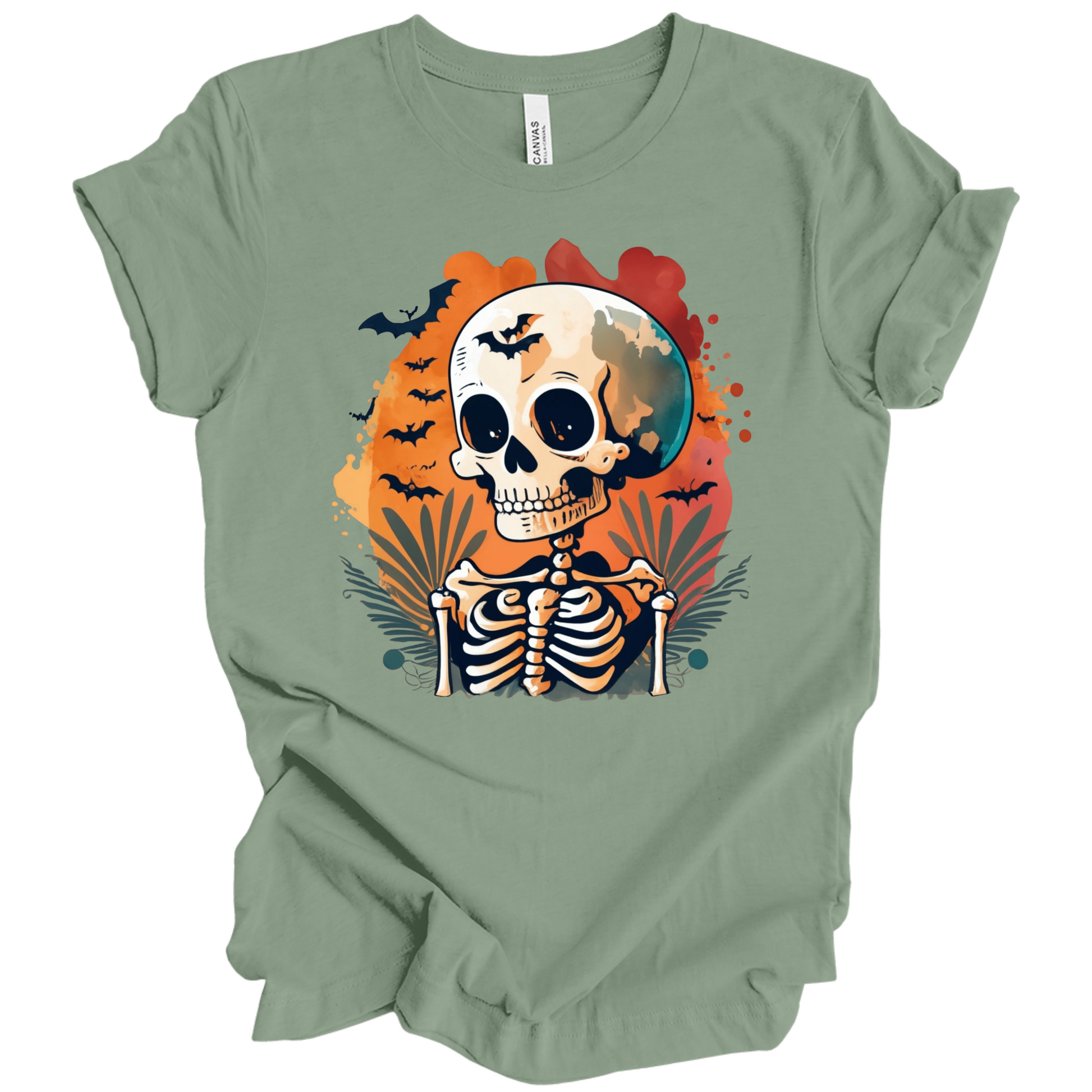 Green t-shirt with a Halloween-themed design featuring a skeleton and skull surrounded with bats.