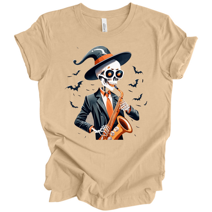 Beige halloween t-shirt with a skeleton playing a saxophone and wearing a witch hat, surrounded by bats.