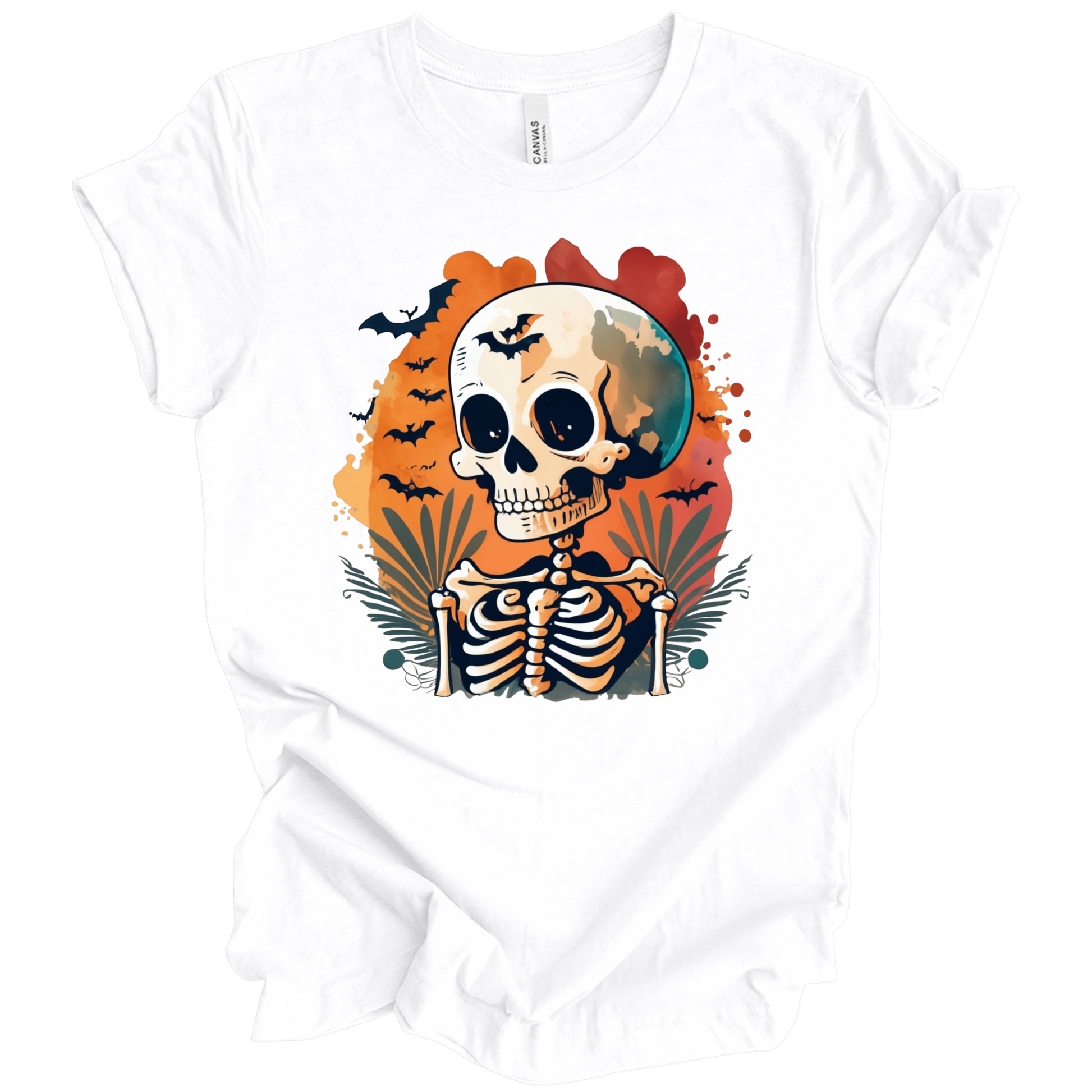 White t-shirt with a Halloween-themed design featuring a skeleton and skull surrounded with bats.